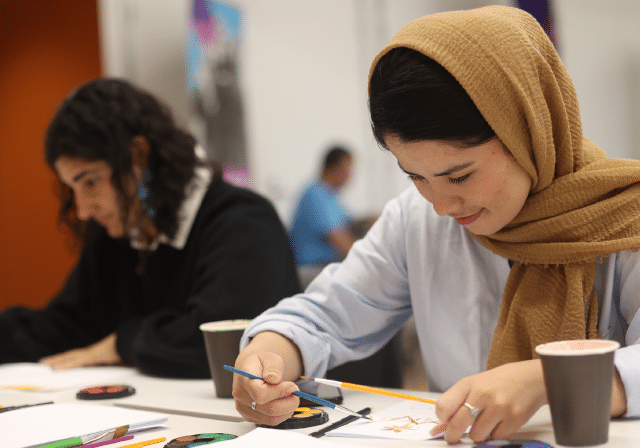 two women partaking in an art class