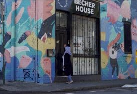 A woman knocks at the Asylum Seekers Centre